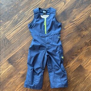 The North Face Blue Overalls with Sleeveless Design and Water-Resistant Material